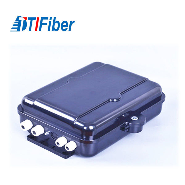 Indoor fiber distribution box open showing SC adapters and fiber routing