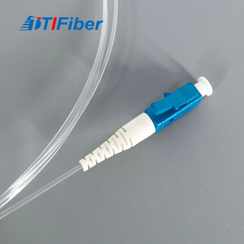 Invisible fiber optic cable nearly transparent against white wall surface